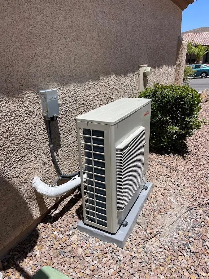Residential air conditioning condenser unit in Taylorville